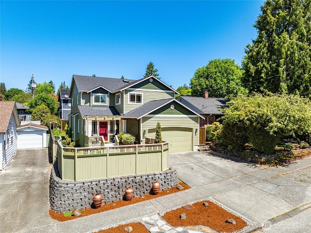 3534 SW Monroe St, Seattle, WA 98126 - view of front of home with concrete driveway and a garage