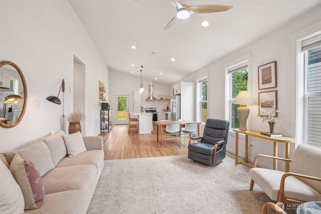 201 SE Alder St, Winlock, WA 98596 - living room featuring ceiling fan, light wood finished floors, recessed lighting, and vaulted ceiling