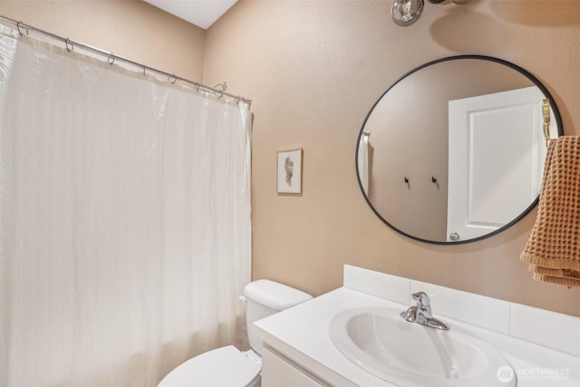 201 SE Alder St, Winlock, WA 98596 - bathroom with vanity, toilet, and shower / tub combo