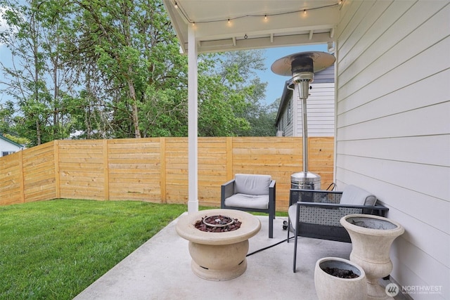 201 SE Alder St, Winlock, WA 98596 - view of patio featuring an outdoor fire pit