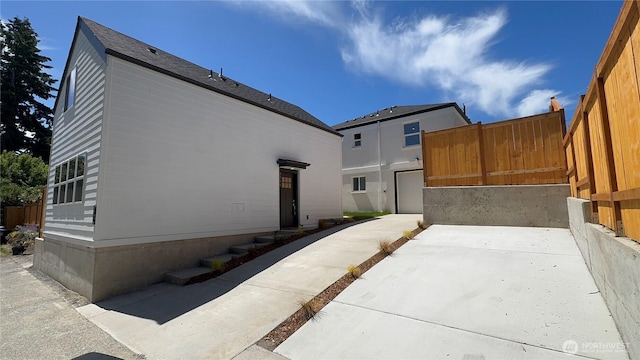 8040 19th Ave NW, Seattle, WA 98117 - rear view of property featuring a patio area