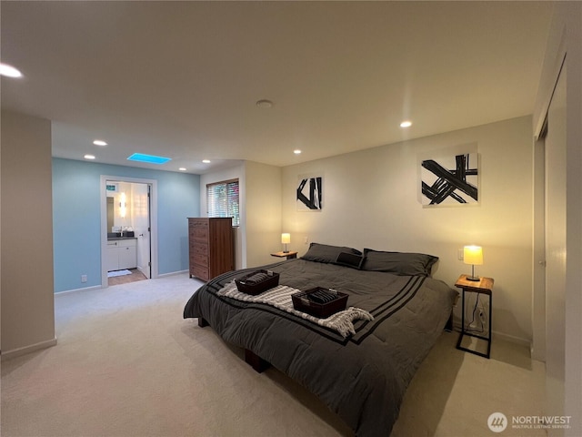 12509 SE 48th Pl, Bellevue, WA 98006 - bedroom with light carpet, recessed lighting, baseboards, and ensuite bathroom