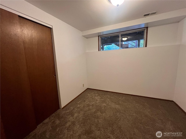 12509 SE 48th Pl, Bellevue, WA 98006 - unfurnished bedroom featuring carpet, a closet, and baseboards
