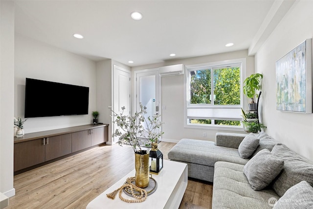 684 SW 100th St, Seattle, WA 98106 - living room with a wall mounted air conditioner, light wood-type flooring, and recessed lighting