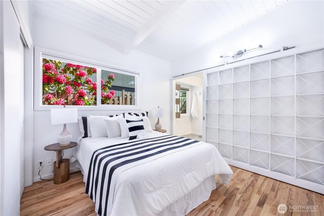 639 130th Ave NE, Bellevue, WA 98005 - bedroom with wood finished floors and wooden ceiling