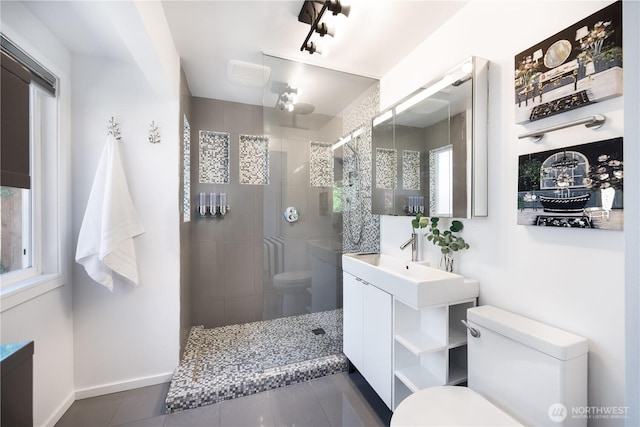 639 130th Ave NE, Bellevue, WA 98005 - full bath with toilet, vanity, tile patterned flooring, walk in shower, and baseboards