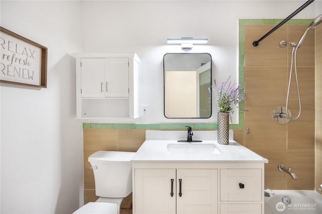639 130th Ave NE, Bellevue, WA 98005 - bathroom with vanity, toilet, tile walls, and shower / bath combination