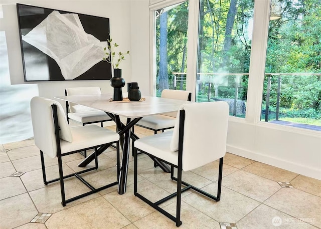 639 130th Ave NE, Bellevue, WA 98005 - dining area featuring light tile patterned flooring and baseboards