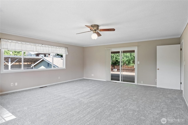 2207 Burcham St, Kelso, WA 98626 - carpeted spare room with ceiling fan, ornamental molding, baseboards, and a textured ceiling