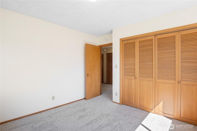 2207 Burcham St, Kelso, WA 98626 - unfurnished bedroom with carpet, a closet, and baseboards