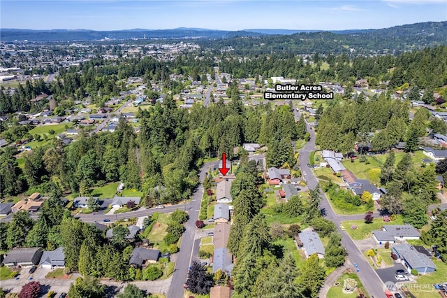 2207 Burcham St, Kelso, WA 98626 - aerial overview of property's location with nearby suburban area