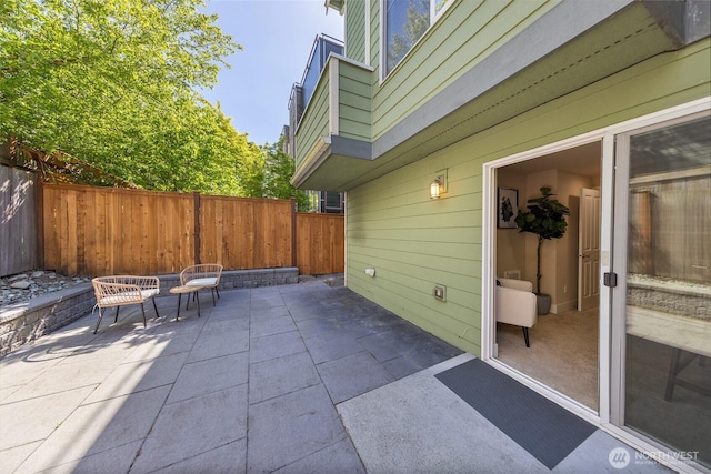 1738 NW 59th St Unit A, Seattle, WA 98107 - fenced backyard featuring a patio
