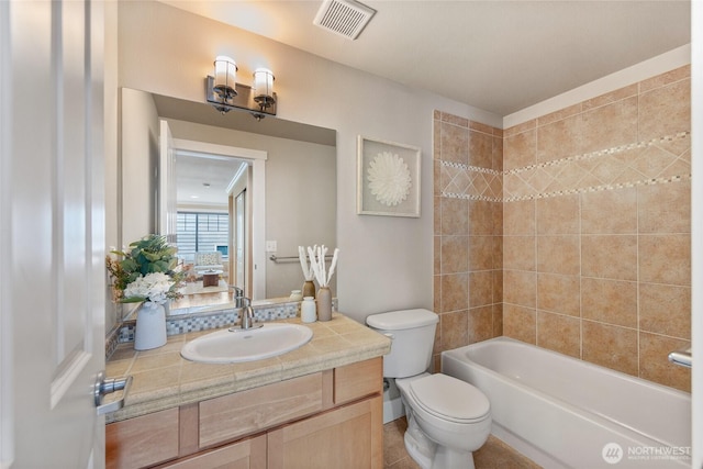 1738 NW 59th St Unit A, Seattle, WA 98107 - bathroom featuring toilet, vanity, and shower / tub combination