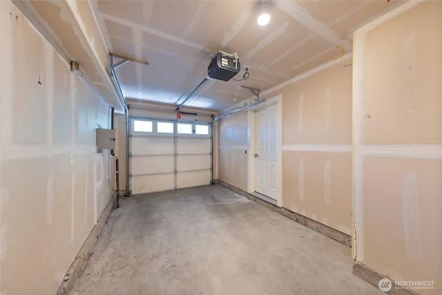 1738 NW 59th St Unit A, Seattle, WA 98107 - garage with a garage door opener and electric panel