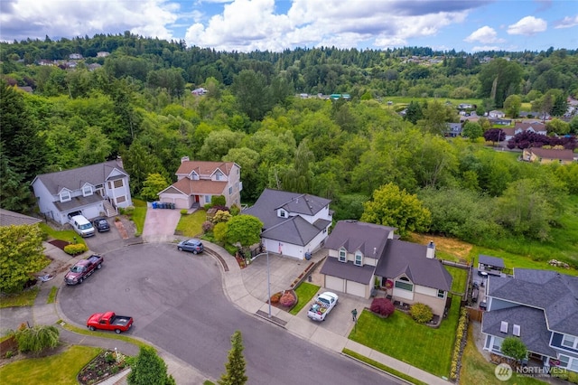 1308 11th Street Pl SW, Puyallup, WA 98371 - aerial perspective of suburban area featuring a heavily wooded area