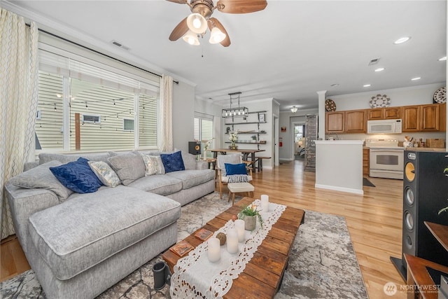 4301 Mckinley St NE, Lacey, WA 98516 - living room with ornamental molding, ceiling fan, light wood-type flooring, and recessed lighting