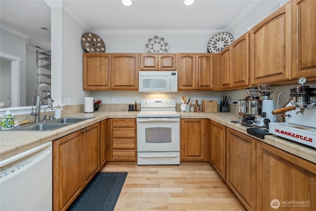 4301 Mckinley St NE, Lacey, WA 98516 - kitchen with white appliances, tile countertops, light wood-style flooring, crown molding, and recessed lighting