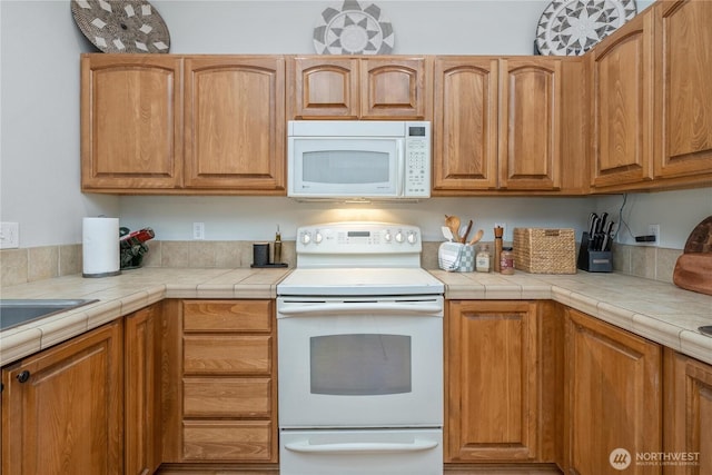 4301 Mckinley St NE, Lacey, WA 98516 - kitchen featuring white appliances and light countertops