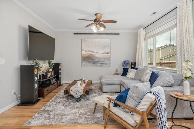 4301 Mckinley St NE, Lacey, WA 98516 - living room with crown molding, a ceiling fan, and light wood-style floors