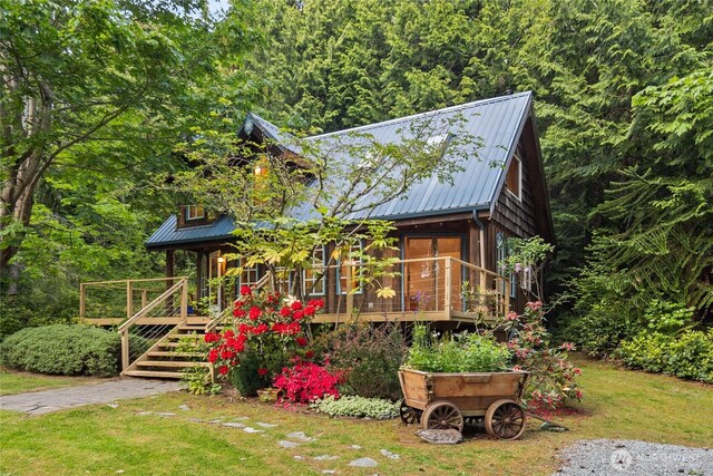 2548 S Camano Dr, Camano Island, WA 98282 - chalet / cabin with metal roof and a front yard