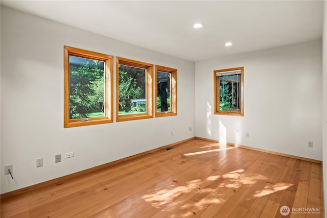 2548 S Camano Dr, Camano Island, WA 98282 - unfurnished room featuring recessed lighting, hardwood / wood-style flooring, and baseboards