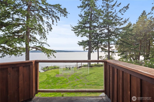 2548 S Camano Dr, Camano Island, WA 98282 - wooden terrace with a water view and a lawn