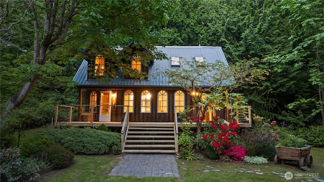 2548 S Camano Dr, Camano Island, WA 98282 - view of front of house with stairway, a porch, and metal roof