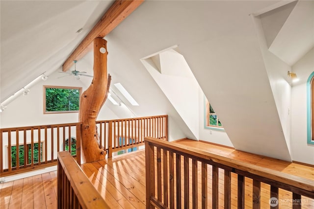 2548 S Camano Dr, Camano Island, WA 98282 - hall with a skylight, hardwood / wood-style flooring, and vaulted ceiling