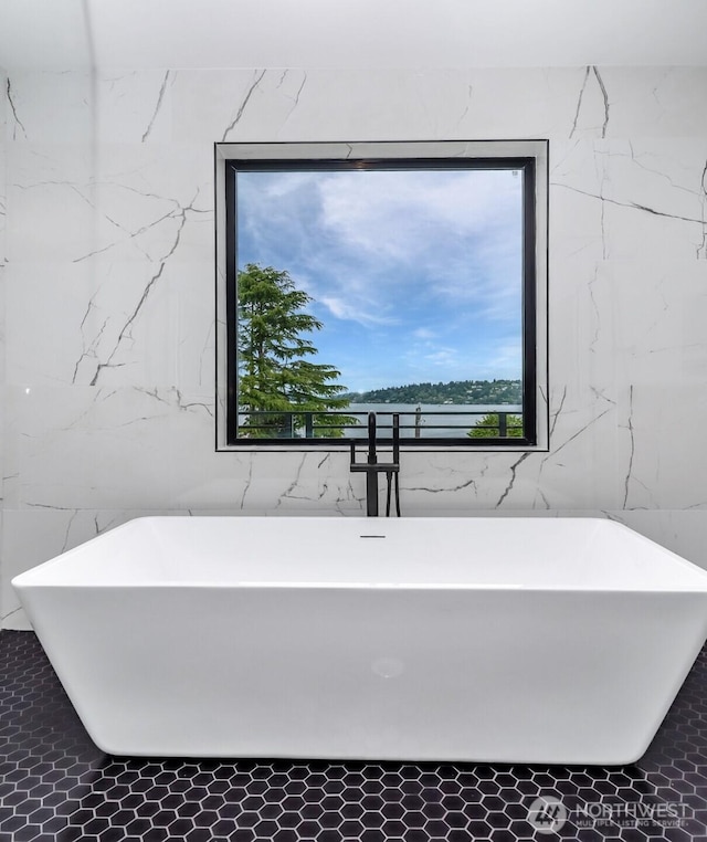 7253 S Taft St, Seattle, WA 98178 - bathroom with a freestanding bath and tile walls