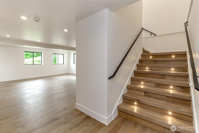7253 S Taft St, Seattle, WA 98178 - staircase with baseboards, wood finished floors, and recessed lighting
