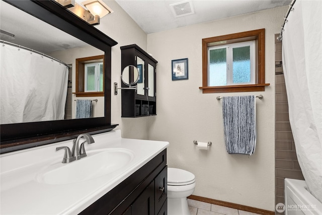 4404 29th Ave SE, Lacey, WA 98503 - full bath featuring vanity, tile patterned floors, and shower / bath combo with shower curtain