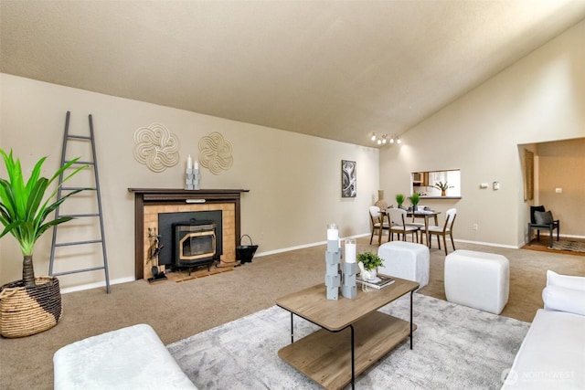 13714 SE 258th Pl Unit 36, Kent, WA 98042 - living area with carpet flooring, a wood stove, baseboards, and high vaulted ceiling