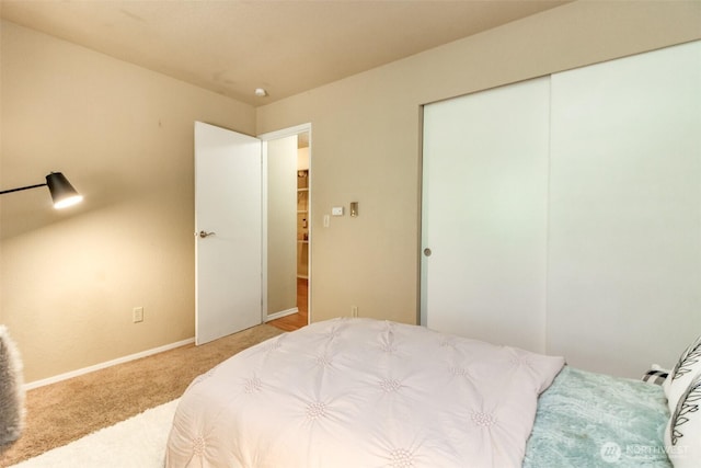 13714 SE 258th Pl Unit 36, Kent, WA 98042 - bedroom featuring carpet, a closet, and baseboards