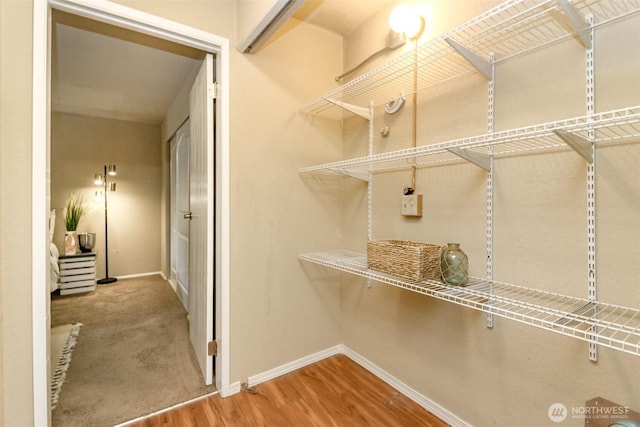 13714 SE 258th Pl Unit 36, Kent, WA 98042 - walk in closet featuring wood finished floors