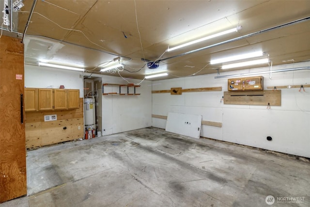 13714 SE 258th Pl Unit 36, Kent, WA 98042 - garage with secured water heater and a garage door opener