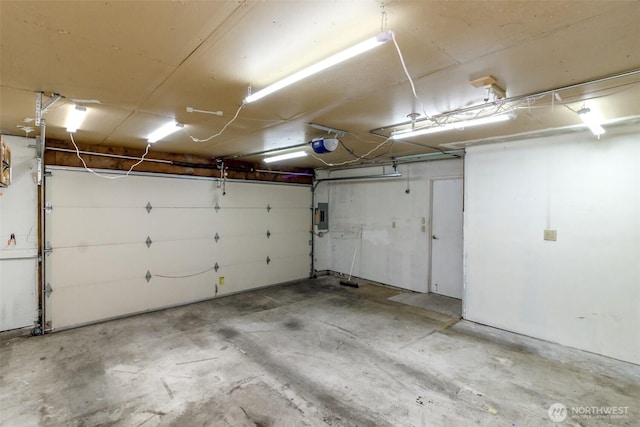 13714 SE 258th Pl Unit 36, Kent, WA 98042 - garage with electric panel and a garage door opener