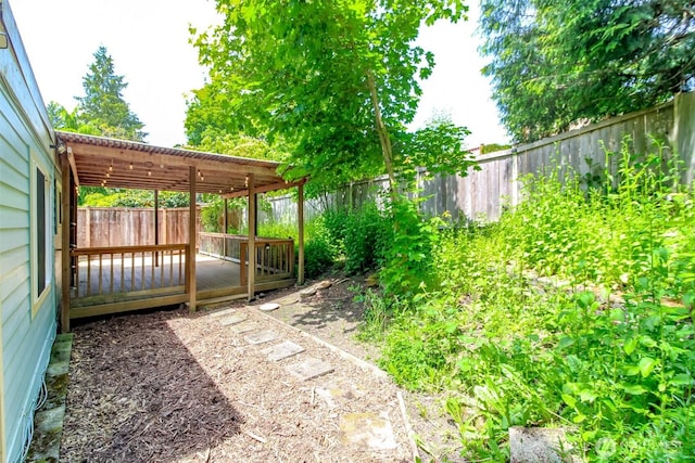 13714 SE 258th Pl Unit 36, Kent, WA 98042 - fenced backyard featuring a deck
