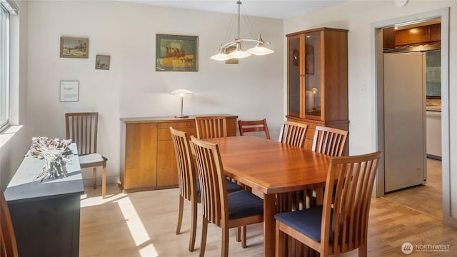1525 E Catalpa St, Othello, WA 99344 - dining area with light wood-style flooring