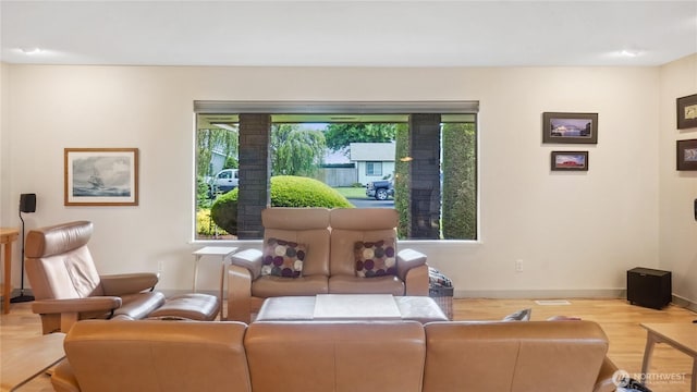 1525 E Catalpa St, Othello, WA 99344 - living room featuring wood finished floors and baseboards