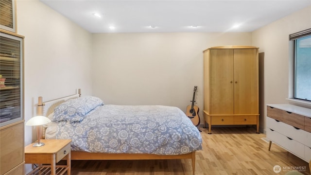 1525 E Catalpa St, Othello, WA 99344 - bedroom with light wood finished floors and recessed lighting