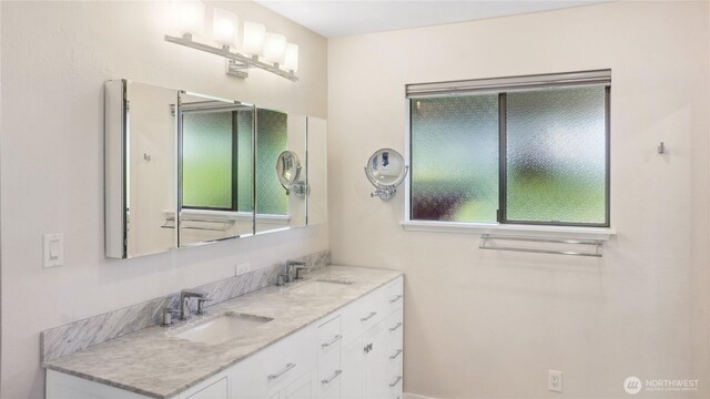 1525 E Catalpa St, Othello, WA 99344 - bathroom featuring double vanity