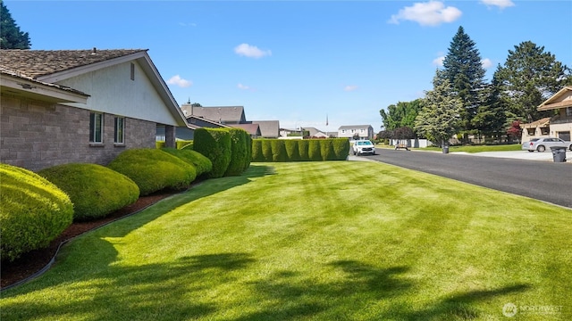 1525 E Catalpa St, Othello, WA 99344 - view of grassy yard with a residential view