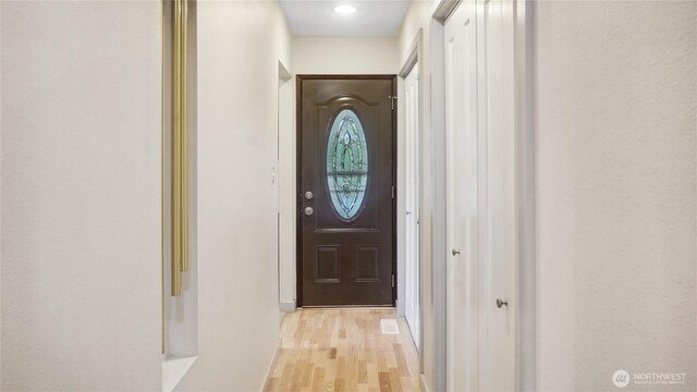 1525 E Catalpa St, Othello, WA 99344 - doorway with light wood finished floors and baseboards