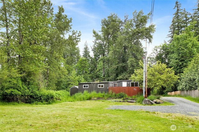 3854 Britton Rd Unit 1, Bellingham, WA 98226 - view of grassy yard with a wooded view