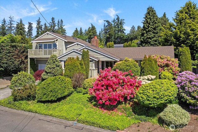 22035 99th Pl W, Edmonds, WA 98020 - view of front of house featuring a balcony and a chimney