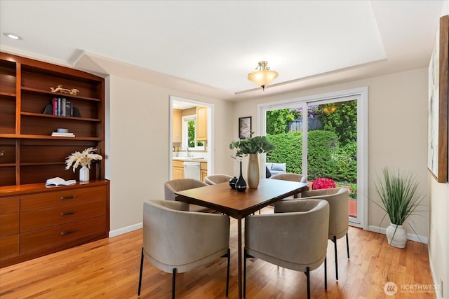 22035 99th Pl W, Edmonds, WA 98020 - dining space featuring baseboards and light wood-type flooring