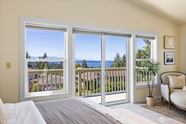 22035 99th Pl W, Edmonds, WA 98020 - bedroom with carpet flooring, vaulted ceiling, a water and mountain view, access to exterior, and baseboards