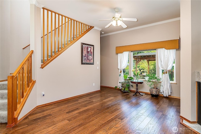 6841 NW Ranger Way, Silverdale, WA 98383 - unfurnished room featuring wood finished floors, stairway, a ceiling fan, crown molding, and baseboards