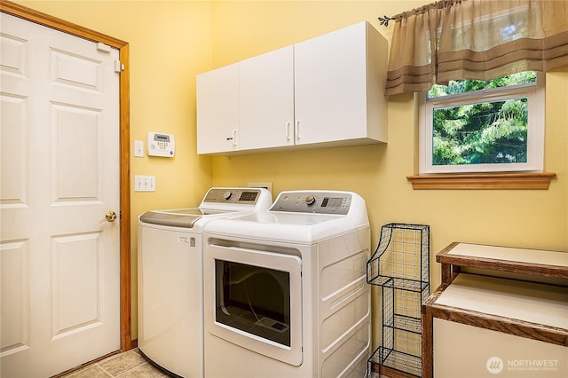6841 NW Ranger Way, Silverdale, WA 98383 - laundry room featuring washer and clothes dryer and cabinet space