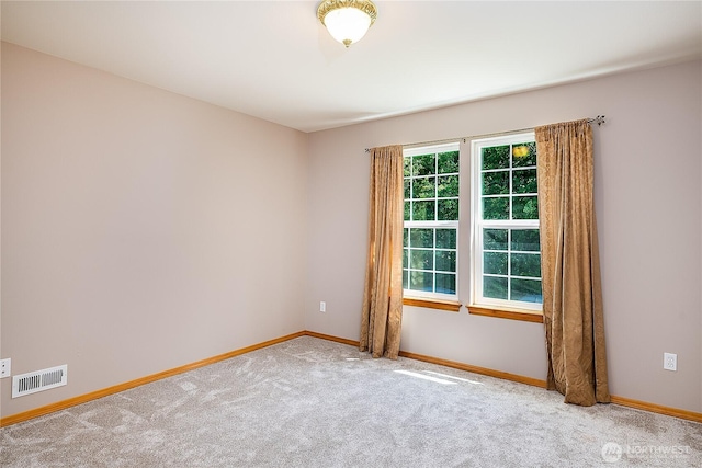 6841 NW Ranger Way, Silverdale, WA 98383 - spare room featuring carpet flooring and baseboards